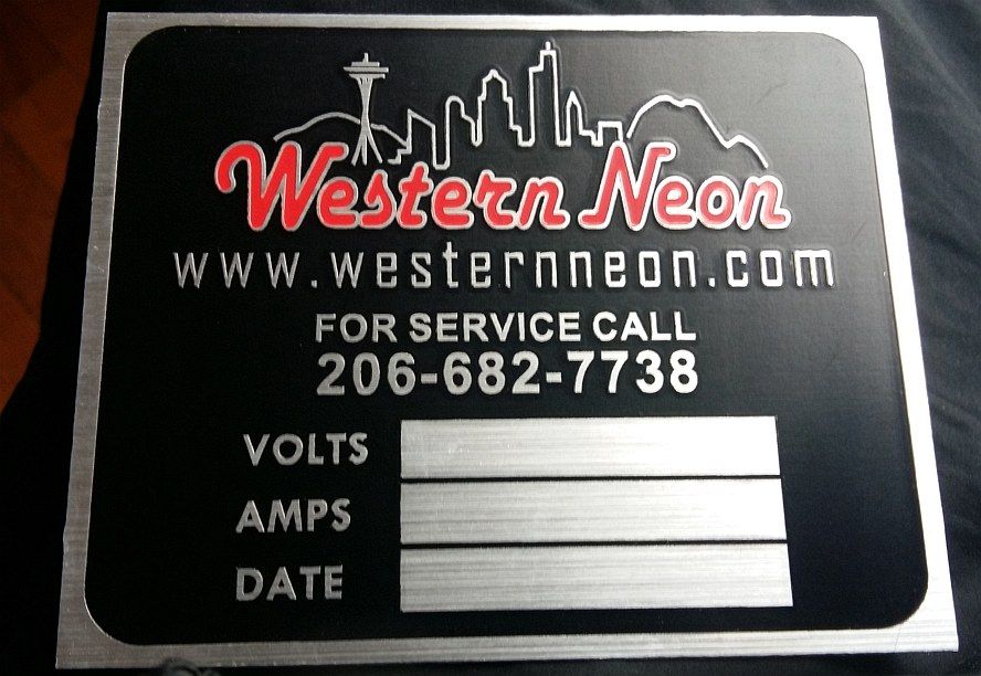 western neon negative etched aluminum brassname
