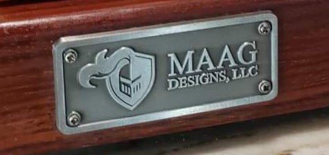 MAAG Cutting board embossed plate side brassname