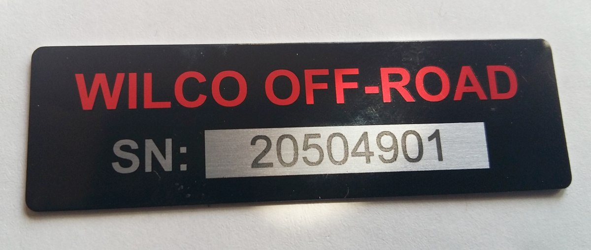 Screen printed black aluminum serial number tags lasered serials Wilco brassname